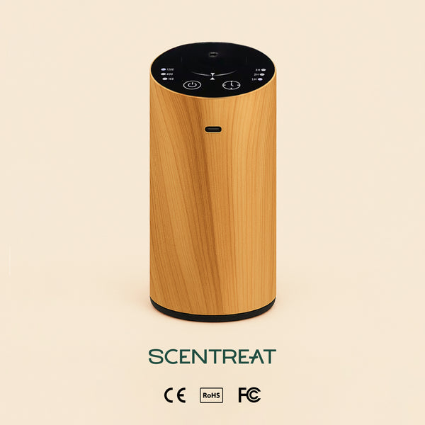 CalmRide Portable Aromatherapy Essential Oil Diffuser on a nightstand