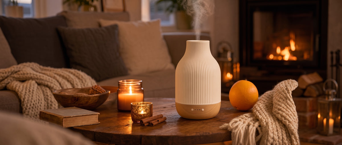 Ceramic ultrasonic essential oil diffuser misting on a coffee table by the fire