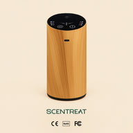 CalmRide Portable Aromatherapy Essential Oil Diffuser on a nightstand