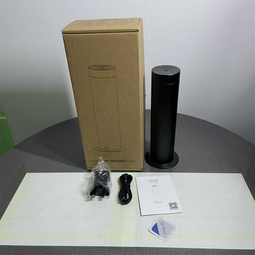 Pillar black cold-air diffuser unboxed with USB-C cable, adapter and manual