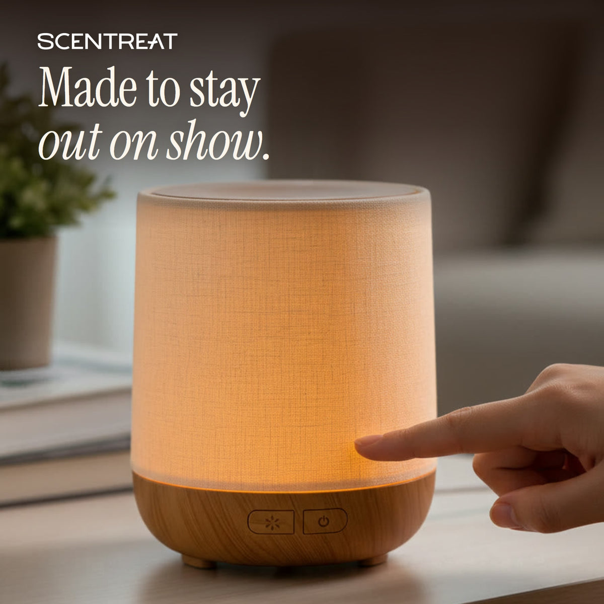 Wood essential oil diffuser with soft fabric cover on solid wood